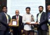 Mr. Gautam Nimmagadda, Founder & CEO, Quixy and his team accept FTCCI Excellence Award in Information Technology by Mr KTR
