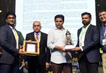 Mr. Gautam Nimmagadda, Founder & CEO, Quixy and his team accept FTCCI Excellence Award in Information Technology by Mr KTR